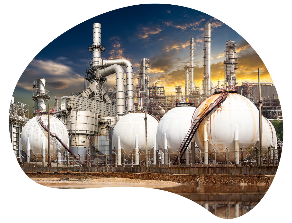 Oil refinery industrial facility with processing units, storage tanks, and refinery equipment in Qatar.